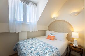 Historic Heartbeat 2BR Townhouse in Central Bliss