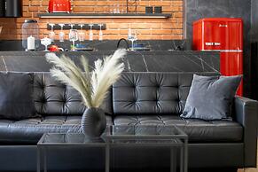 Grey and Red Apartment by Renters