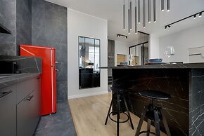 Grey and Red Apartment by Renters