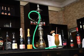 Signatious Hotel and Suites