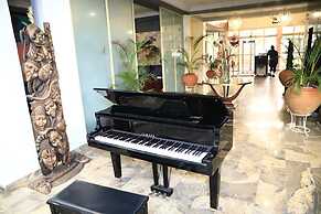 Signatious Hotel and Suites