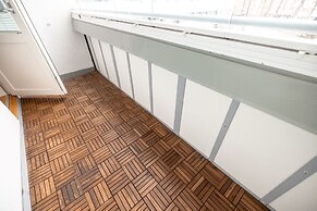 2ndhomes Cozy 1BR Apartment with Balcony