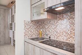 Comfort And Minimalist Studio At Amethyst Apartment