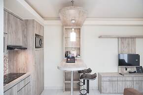 Comfort And Minimalist Studio At Amethyst Apartment