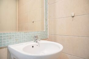 Homey And Warm 2Br At Marina Ancol Apartment