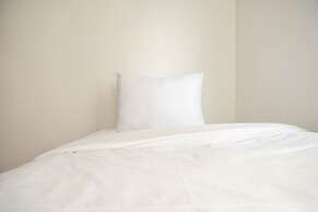 Homey And Warm 2Br At Marina Ancol Apartment