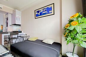 Homey And Warm 2Br At Signature Park Grande Apartment