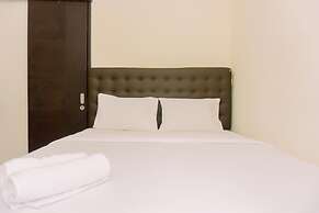 Modern Look And Homey 2Br At Great Western Resort Apartment