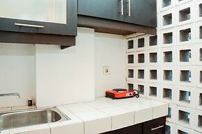 Homey Studio Apartment At Margonda Residence 1