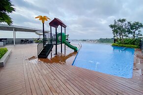 Homey And Cozy Living Studio Amartha View Apartment