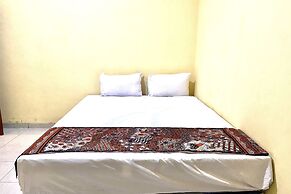 Capital O 93601 Manda Homestay Syariah