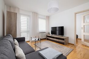 Grey Apartment in Katowice by Renters