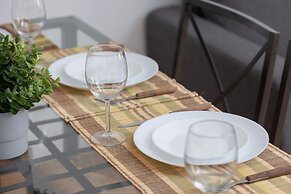 Grey Apartment in Katowice by Renters