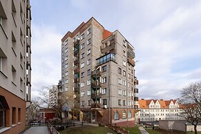 Grey Apartment in Katowice by Renters