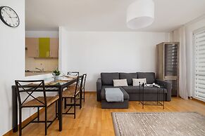Grey Apartment in Katowice by Renters