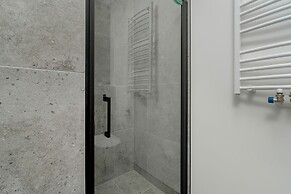 Dark Grey Apartment in Poznan by Renters