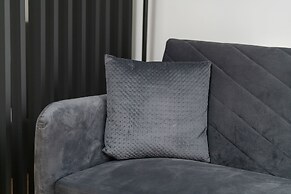 Dark Grey Apartment in Poznan by Renters