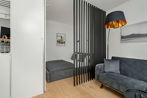 Dark Grey Apartment in Poznan by Renters