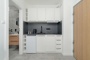 Dark Grey Apartment in Poznan by Renters