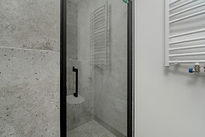 Dark Grey Apartment in Poznan by Renters