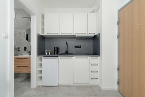 Dark Grey Apartment in Poznan by Renters