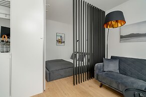 Dark Grey Apartment in Poznan by Renters