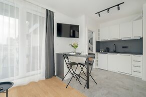 Dark Grey Apartment in Poznan by Renters