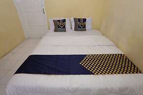 SPOT ON 93610 Syariah Homestay