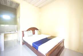 SPOT ON 93612 Kencana Homestay Syariah Near Masjid AL-BAROKAH Kanyuran