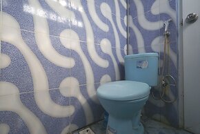 SPOT ON 93620 Anisa Homestay Syariah Near Pantai Gemah Tulungaggung