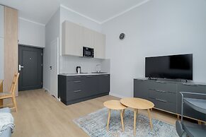 Stylish Grey Studio in Poznan by Renters