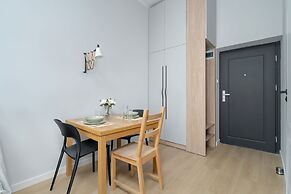 Stylish Grey Studio in Poznan by Renters