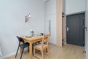 Stylish Grey Studio in Poznan by Renters