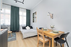 Stylish Grey Studio in Poznan by Renters