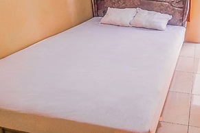 OYO 93683 Kost Naura