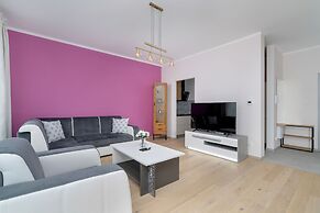 Dark Grey and Pink Apartment by Renters