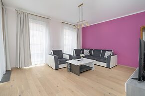 Dark Grey and Pink Apartment by Renters