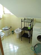 Spacious and Naturally Bright Bomboniera Rooftop Favors Apartment