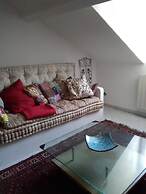 Spacious and Naturally Bright Bomboniera Rooftop Favors Apartment