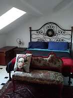 Spacious and Naturally Bright Bomboniera Rooftop Favors Apartment