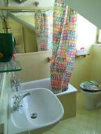 Spacious and Naturally Bright Bomboniera Rooftop Favors Apartment