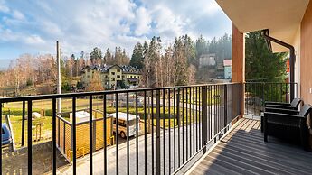 Apartamenty Sun & Snow Ostoja Parku Narodowego