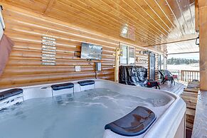 Cozy Duck Creek Village Cabin w/ Hot Tub & Views!
