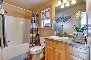 Cozy Duck Creek Village Cabin w/ Hot Tub & Views!