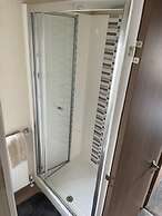 Premium 2 bed Caravan Sleeps 6 With Huge Decking