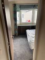 Premium 2 bed Caravan Sleeps 6 With Huge Decking