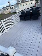 Premium 2 bed Caravan Sleeps 6 With Huge Decking