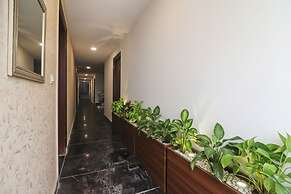 FabHotel Roadway Inn