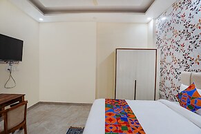 Fabhotel Ada Residency