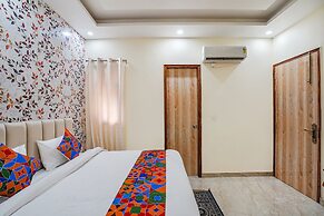 Fabhotel Ada Residency